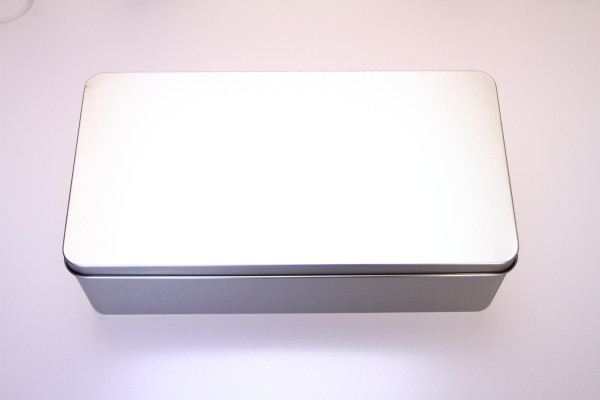 Metal box with slip lid